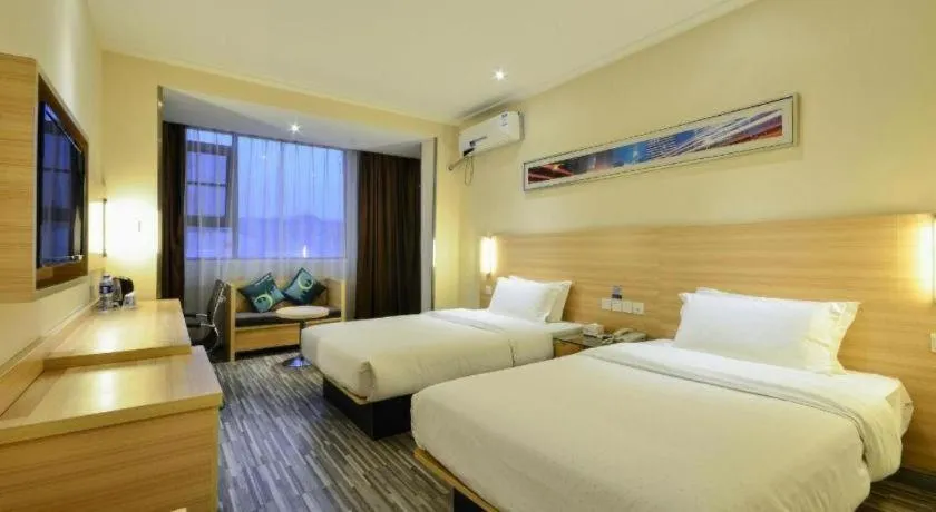 Bed in City Comfort Inn Yichang Wanda Plaza Yunhe Park