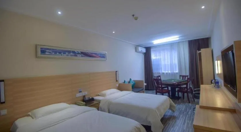Bed in City Comfort Inn Yichang Wanda Plaza Yunhe Park