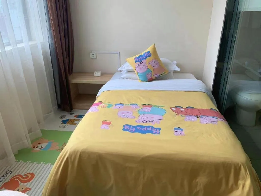 Bed in City Comfort Inn Yichang Wanda Plaza Yunhe Park