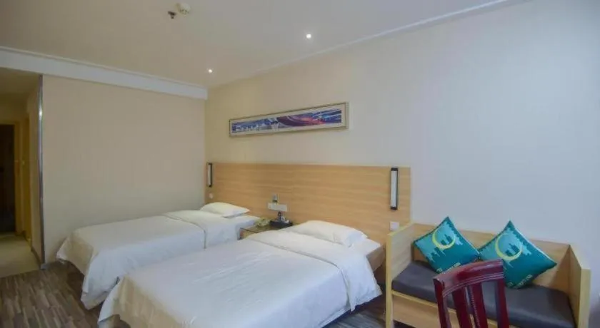 Bed in City Comfort Inn Yichang Wanda Plaza Yunhe Park