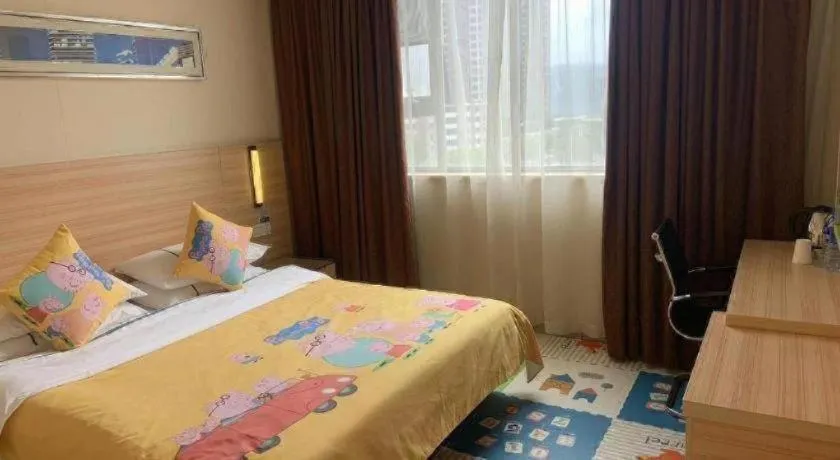 Bed in City Comfort Inn Yichang Wanda Plaza Yunhe Park