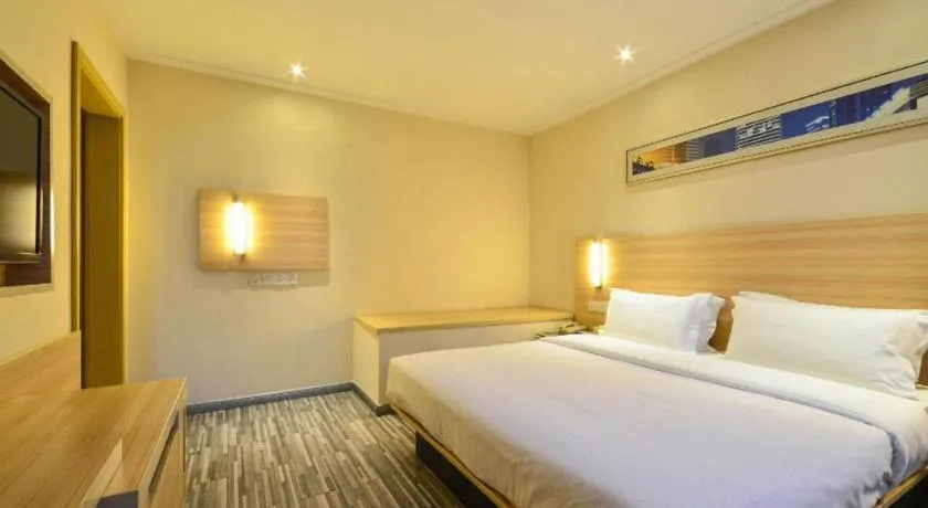 Bed in City Comfort Inn Yichang Wanda Plaza Yunhe Park