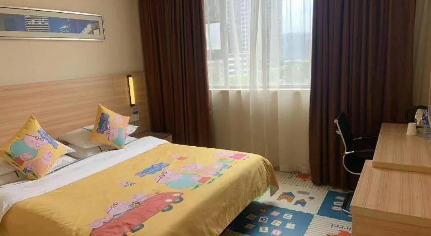 Bed in City Comfort Inn Yichang Wanda Plaza Yunhe Park
