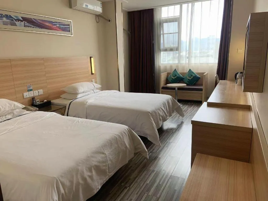 Bed in City Comfort Inn Yichang Wanda Plaza Yunhe Park