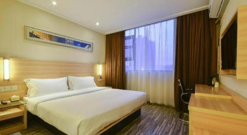Bed in City Comfort Inn Yichang Wanda Plaza Yunhe Park