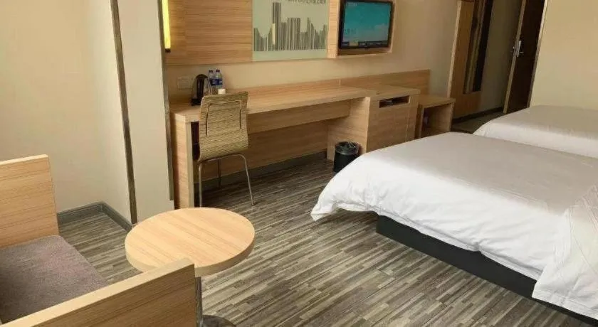 Bed in City Comfort Inn Yichang Wanda Plaza Yunhe Park