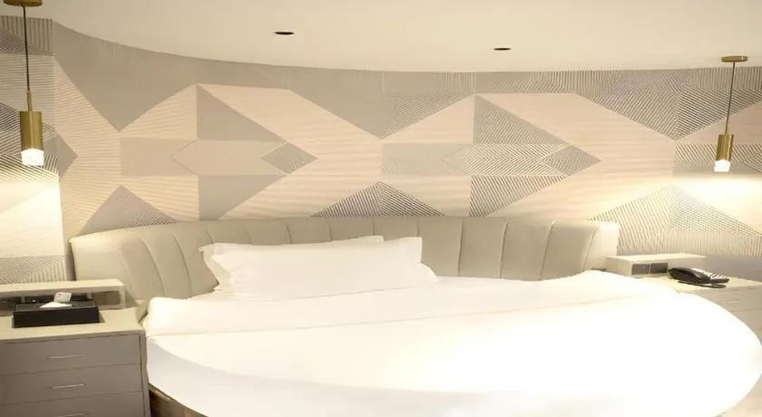 Bed in Borrman Hotel Pingyi Beifang Shicaicheng Mingde Road