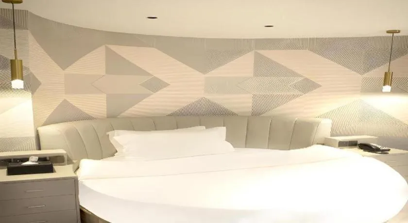 Bed in Borrman Hotel Pingyi Beifang Shicaicheng Mingde Road