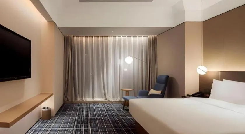 Bed in Onejee Hotel Shenzhen