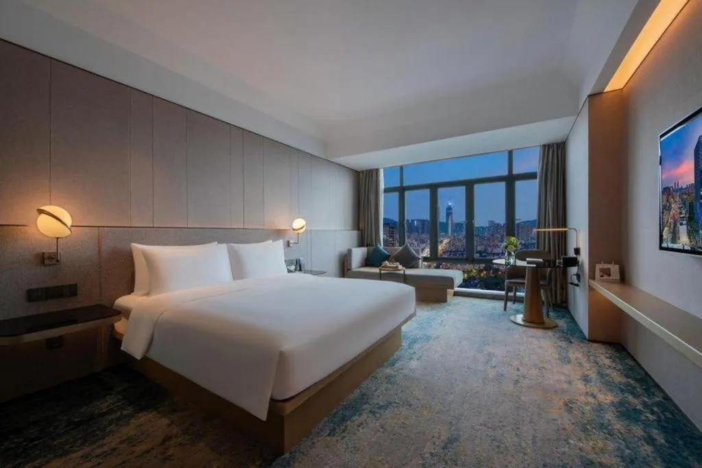 Bed in Onejee Hotel Shenzhen