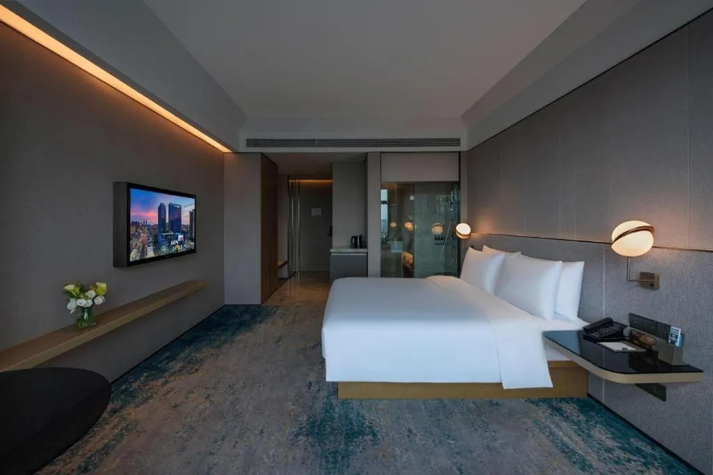 Bed in Onejee Hotel Shenzhen