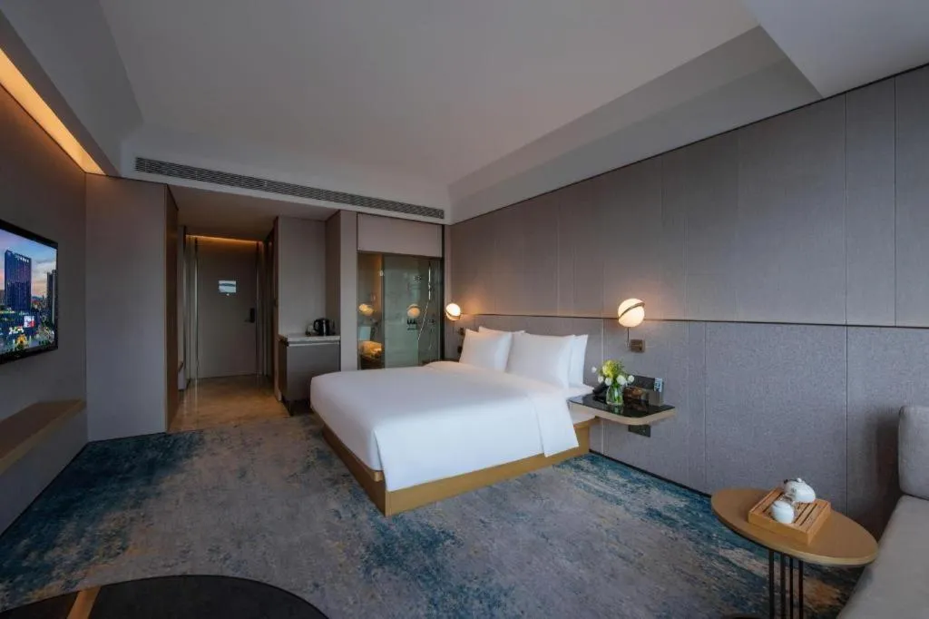 Bed in Onejee Hotel Shenzhen