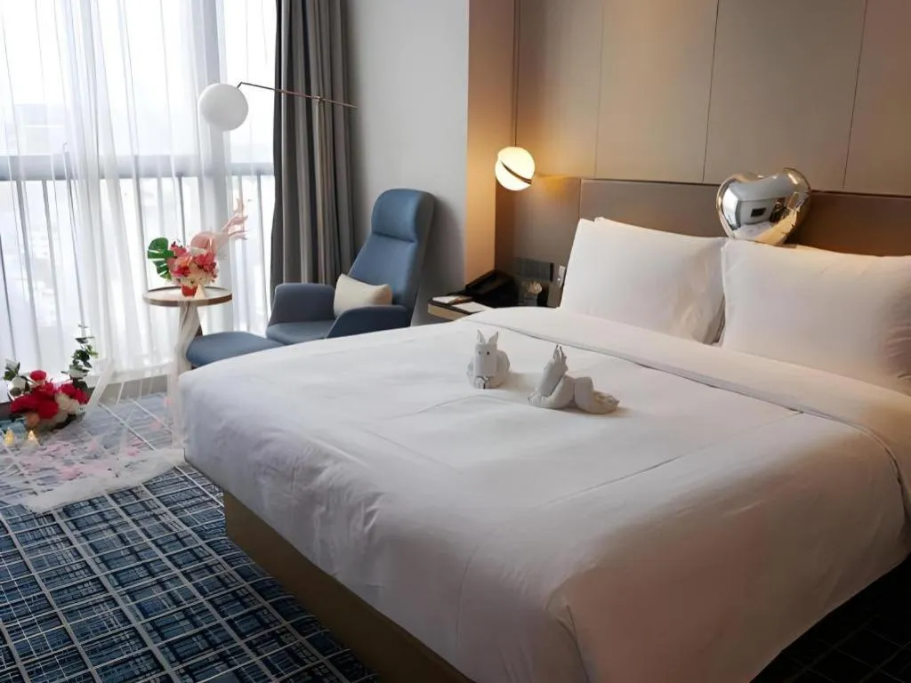 Bed in Onejee Hotel Shenzhen