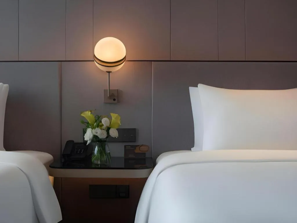 Bed in Onejee Hotel Shenzhen