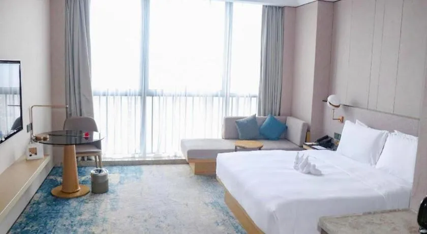 Bed in Onejee Hotel Shenzhen