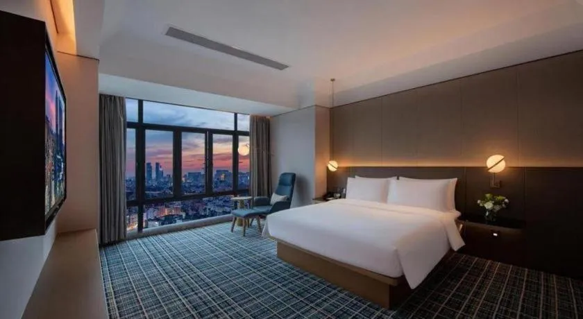 Bed in Onejee Hotel Shenzhen