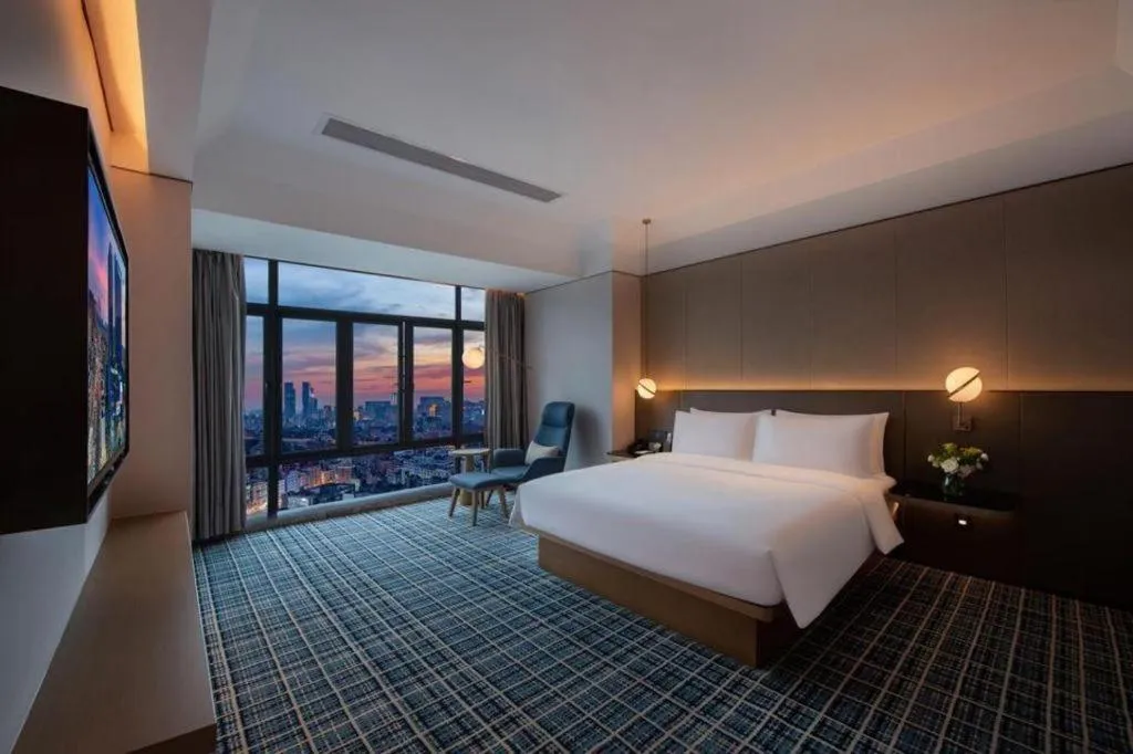 Bed in Onejee Hotel Shenzhen