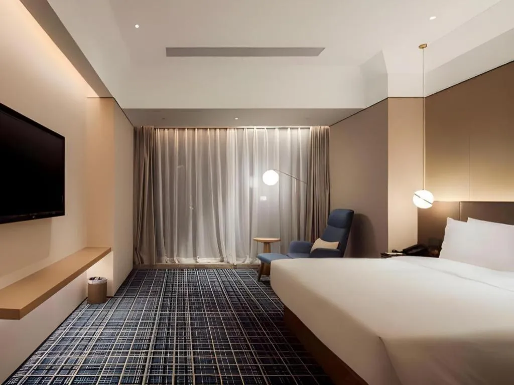 Bed in Onejee Hotel Shenzhen