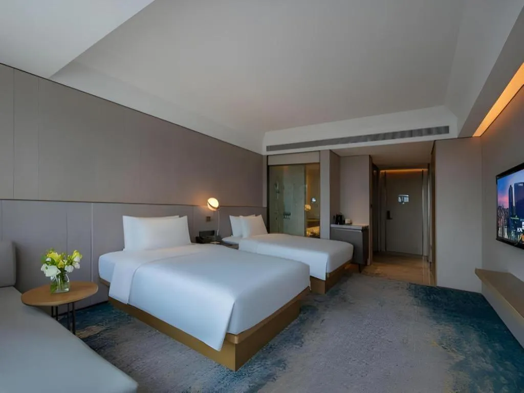 Bed in Onejee Hotel Shenzhen