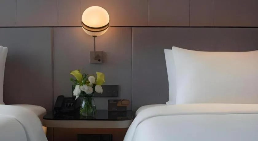 Bed in Onejee Hotel Shenzhen