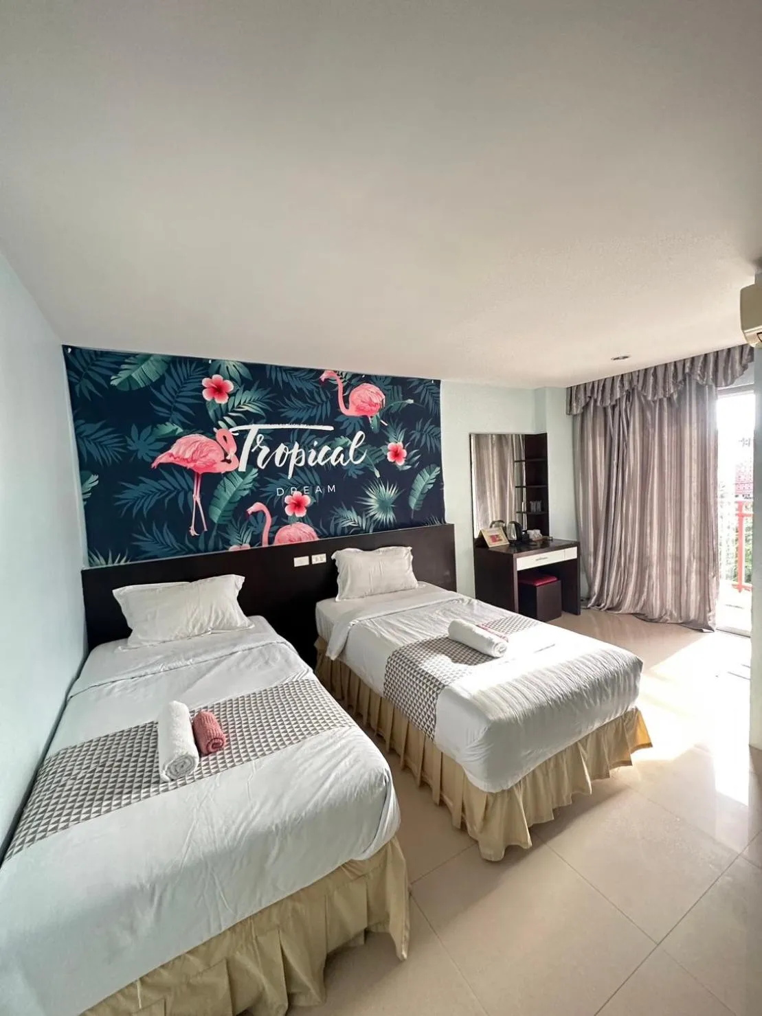 Bed in Sunflower HLD Hotel