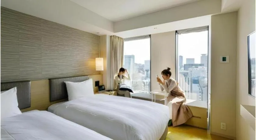 Bed in Montblanc Hotel Raffine Nagoyaekimae