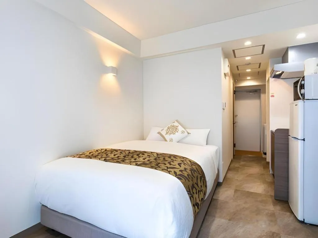 Bed in BIBI hotel kokusaidori