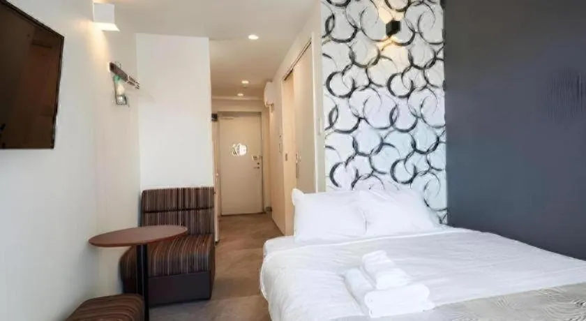 Bed in BIBI hotel kokusaidori