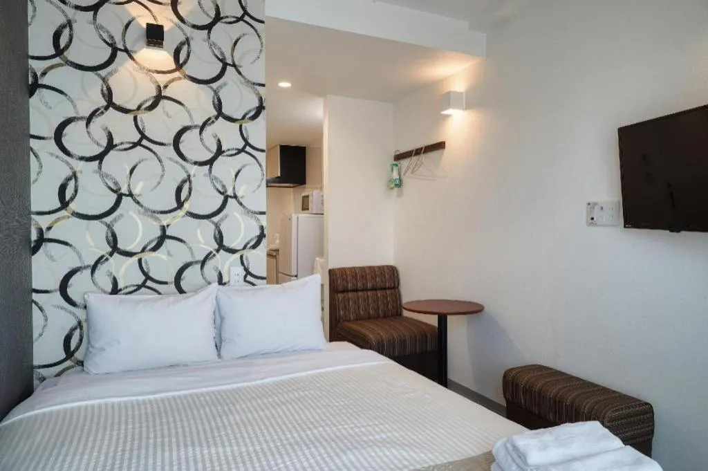 Bed in BIBI hotel kokusaidori