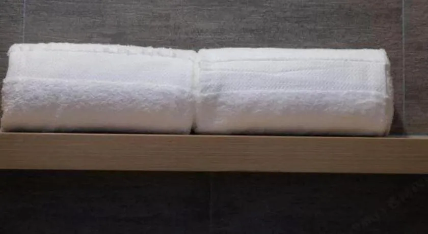 Bed in Atour Hotel Jinan Tangyan Century Avenue