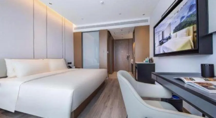 Bed in Atour Hotel Jinan Tangyan Century Avenue