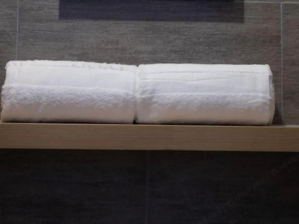 Bed in Atour Hotel Jinan Tangyan Century Avenue