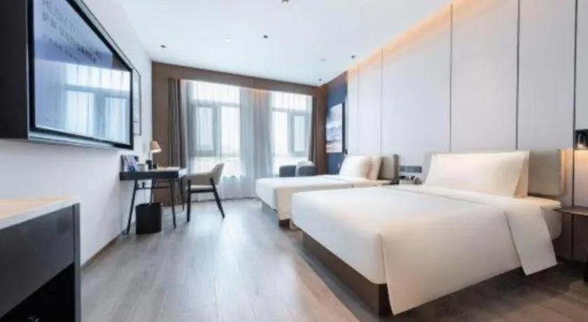 Bed in Atour Hotel Jinan Tangyan Century Avenue