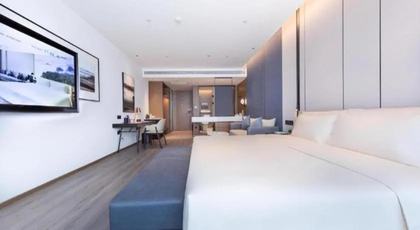 Bed in Atour Hotel Jinan Tangyan Century Avenue