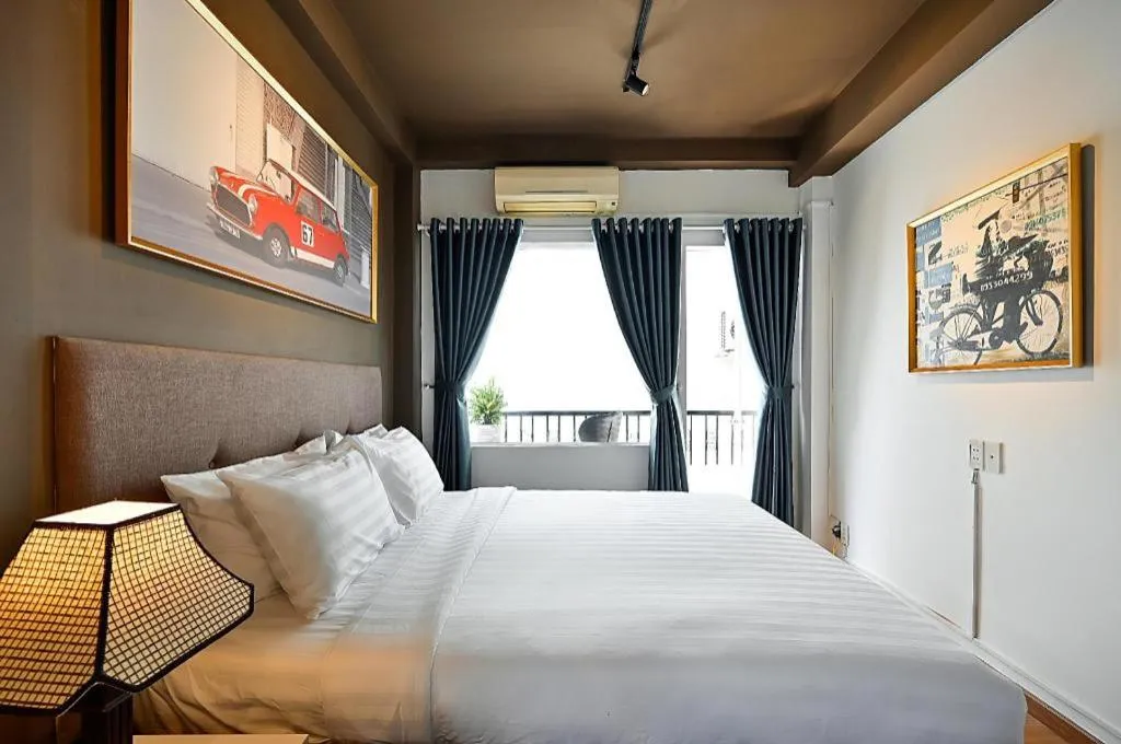 Bed in The Noble Swan WoodPark Hotel