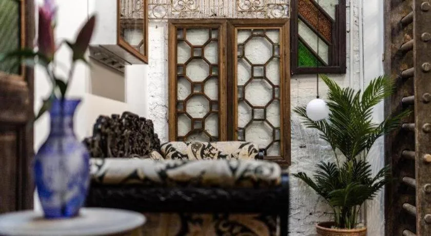 Bed in Origin Antique House and Hotel