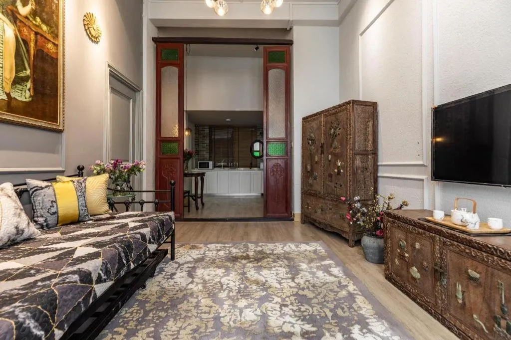 Bed in Origin Antique House and Hotel