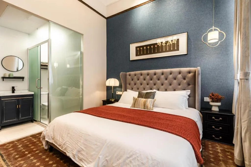 Bed in Origin Antique House and Hotel