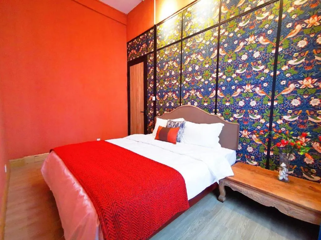 Bed in Origin Antique House and Hotel