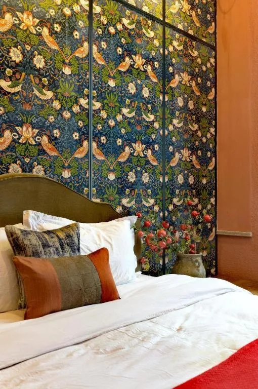 Bed in Origin Antique House and Hotel