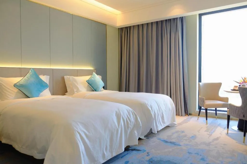 Bed in Yinhu Junyi Hotel（Wildlife Park）