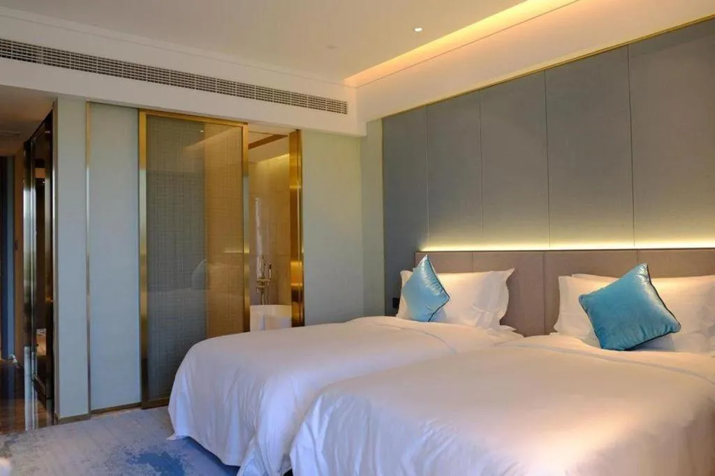 Bed in Yinhu Junyi Hotel（Wildlife Park）