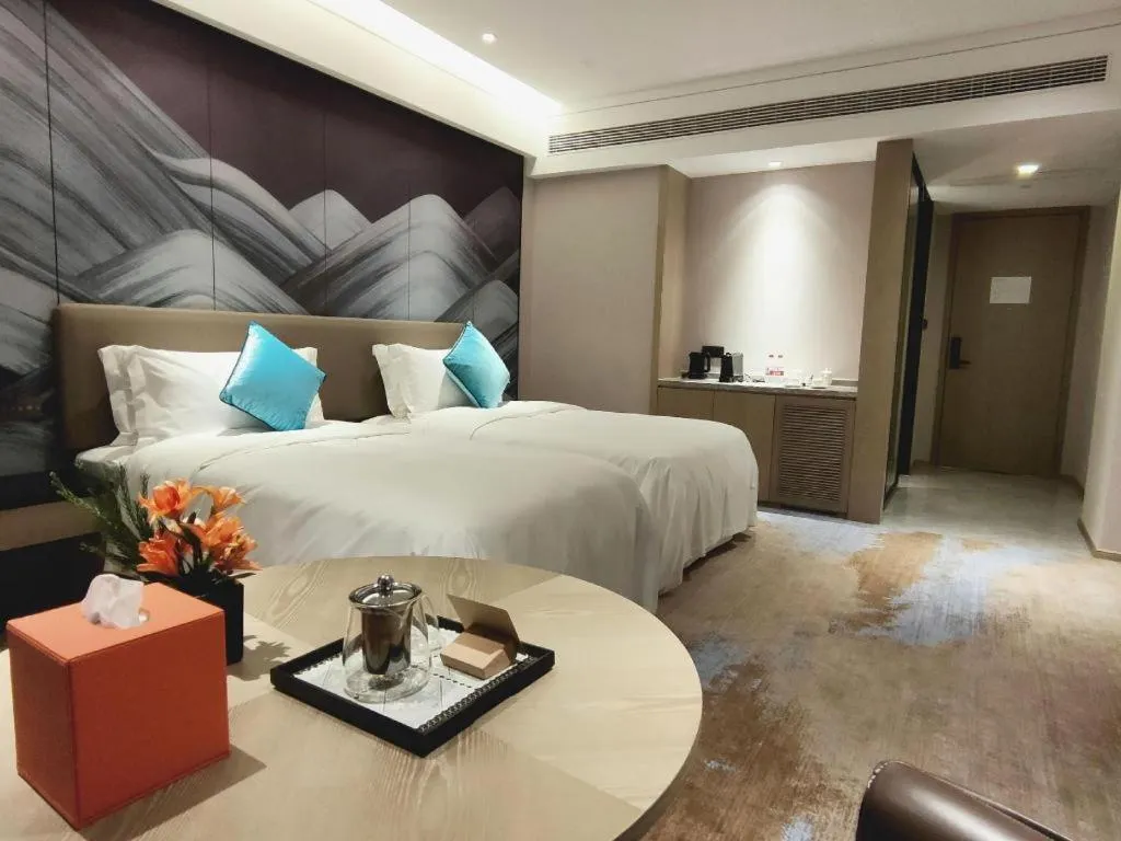 Bed in Yinhu Junyi Hotel（Wildlife Park）