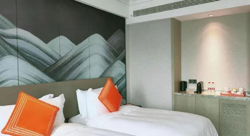 Bed in Yinhu Junyi Hotel（Wildlife Park）