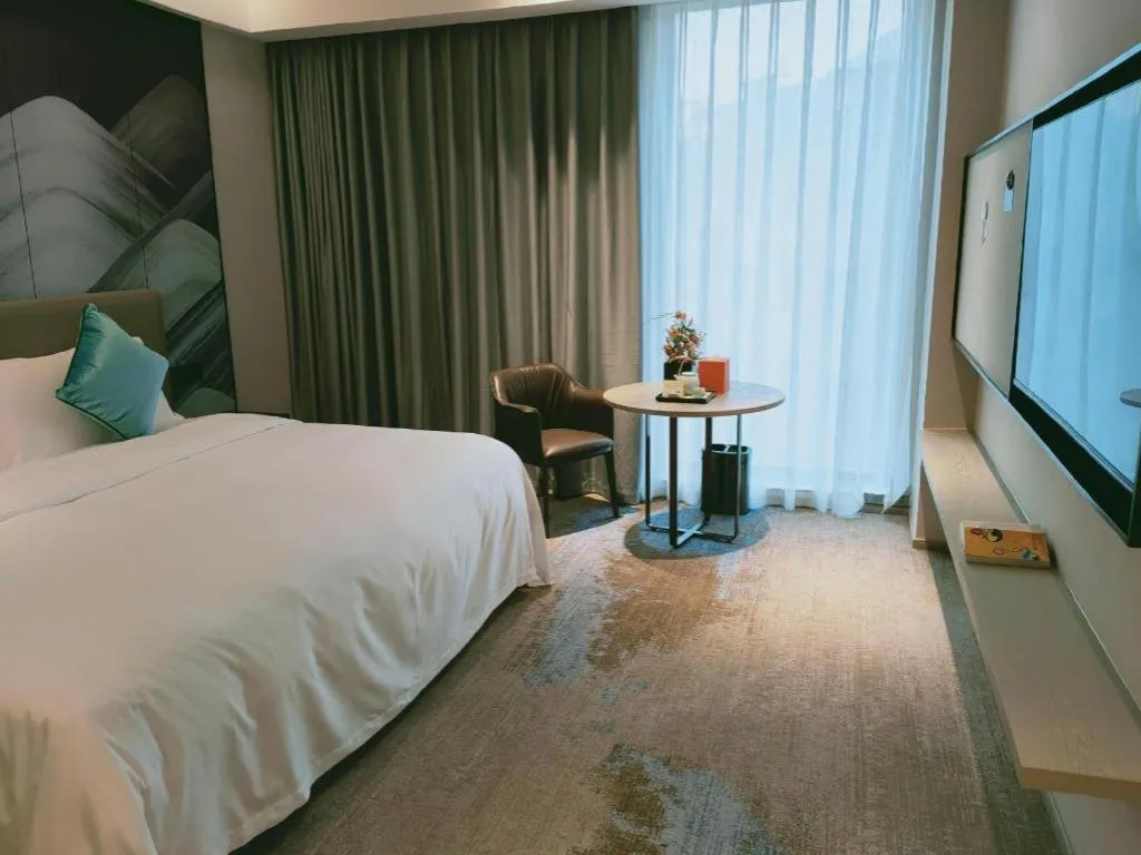 Bed in Yinhu Junyi Hotel（Wildlife Park）