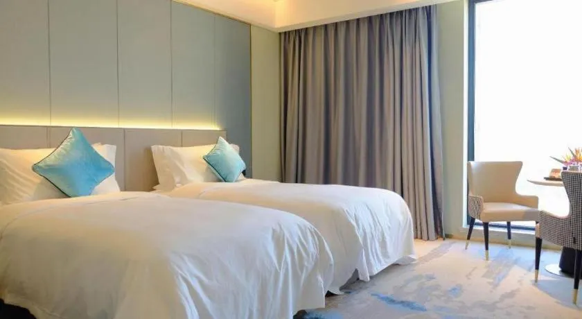 Bed in Yinhu Junyi Hotel（Wildlife Park）