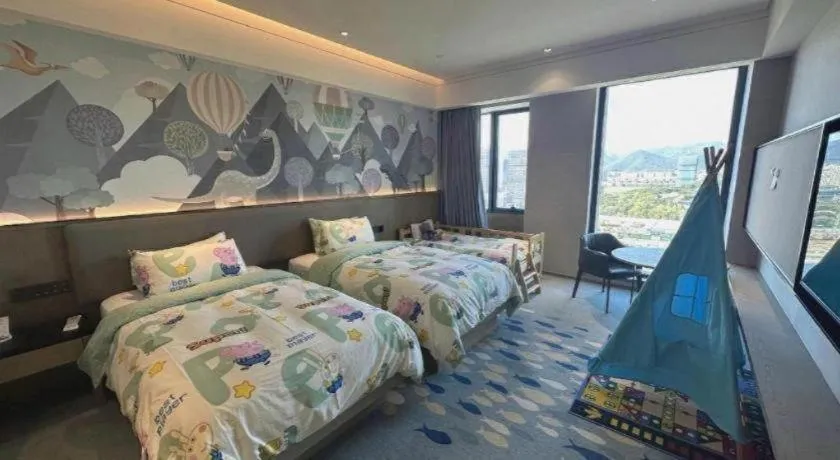 Bed in Yinhu Junyi Hotel（Wildlife Park）