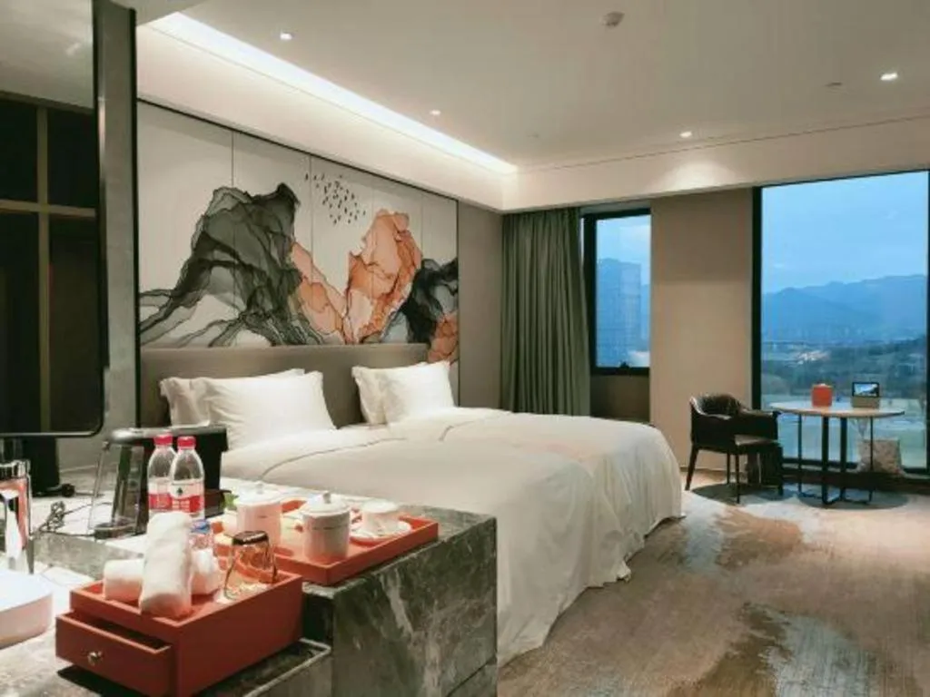 Bed in Yinhu Junyi Hotel（Wildlife Park）