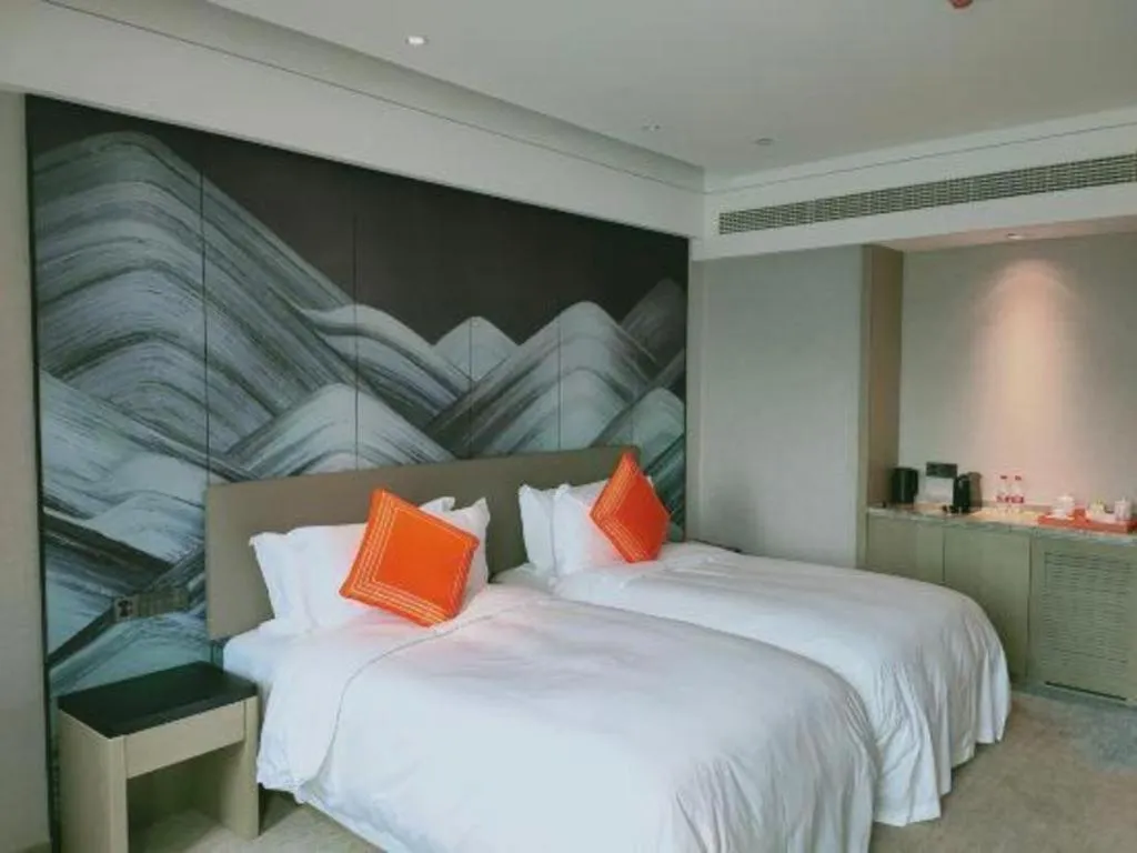 Bed in Yinhu Junyi Hotel（Wildlife Park）