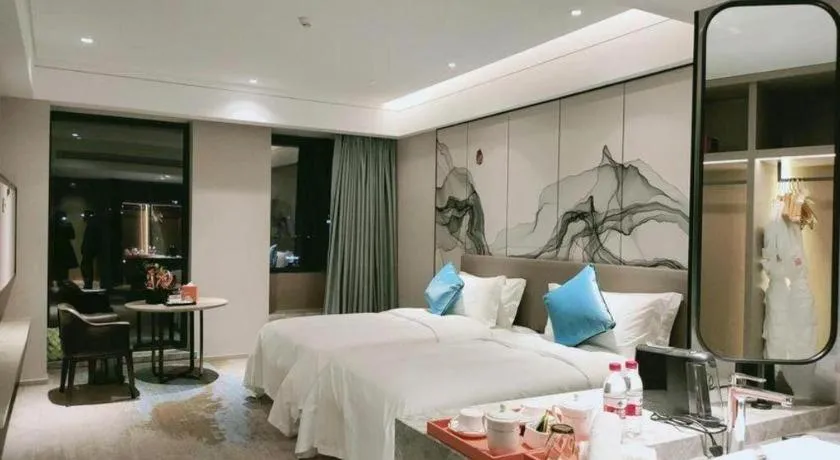 Bed in Yinhu Junyi Hotel（Wildlife Park）